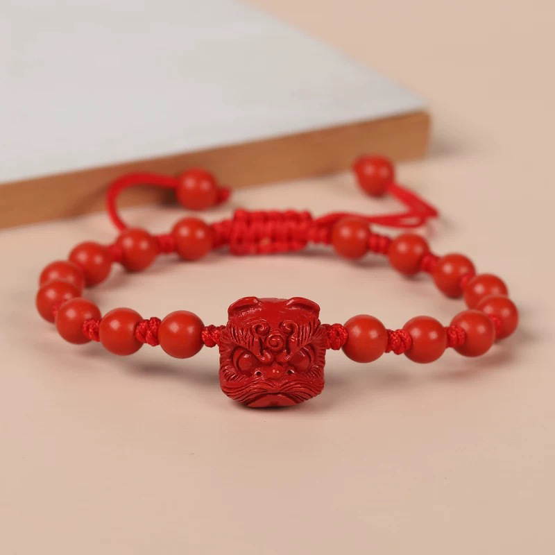 Echte rode Cinnaber leeuwendan - Gemstone Bracelet Healing recensie en prijs