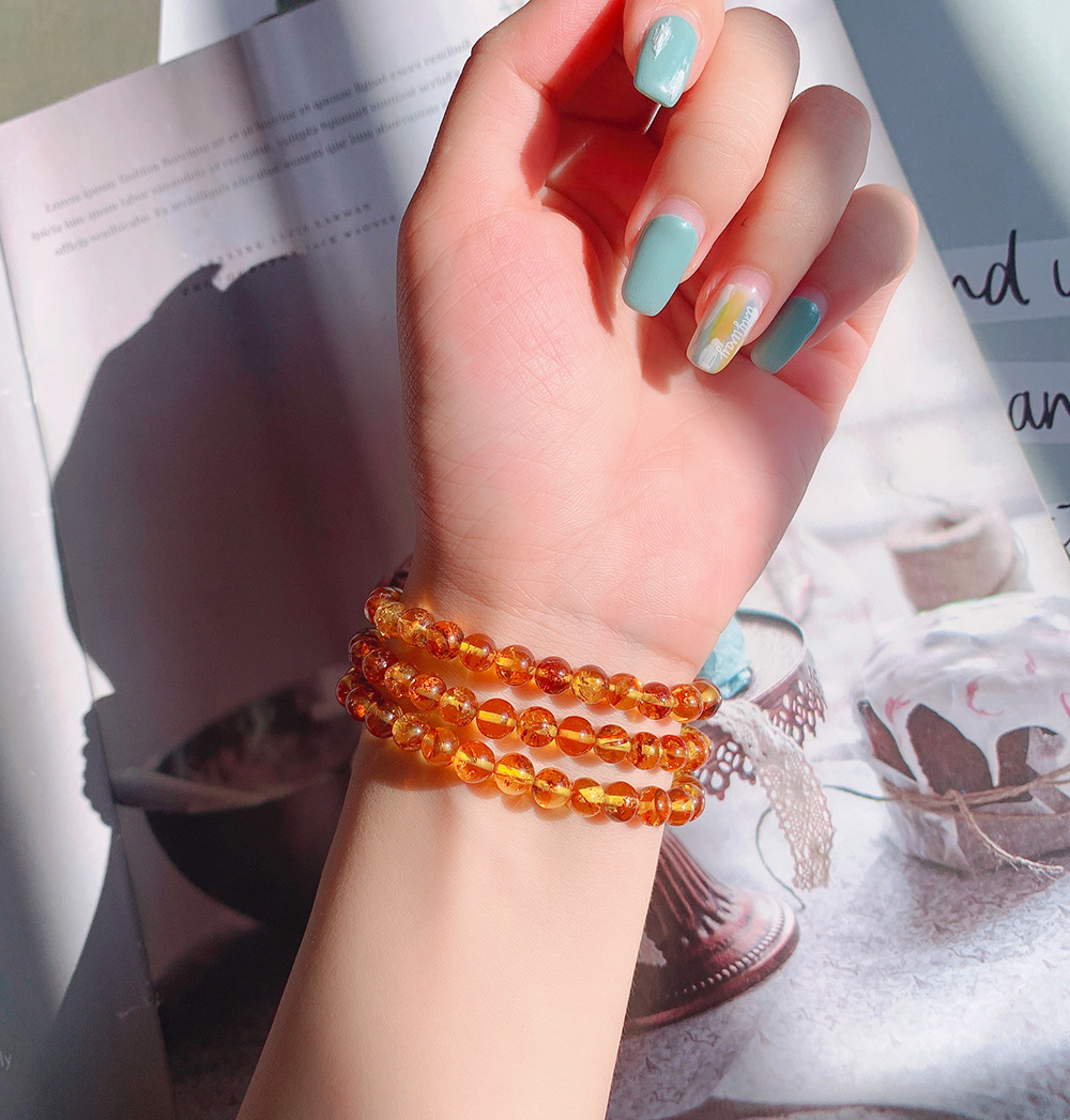Natuurlijke Piebald Amber Oran - Gemstone Bracelet Healing recensie en prijs